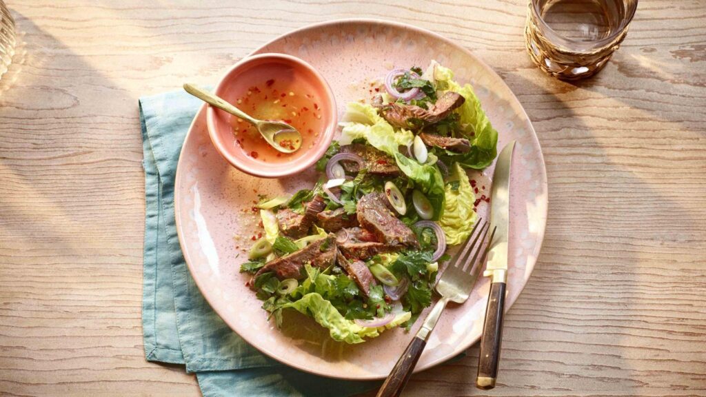 Thai beef salad nam tok with jim jaew dressing